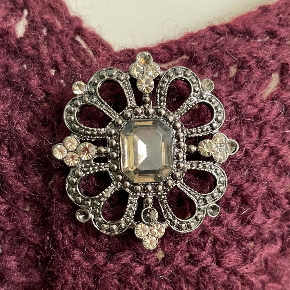 Elegant Silver Brooch with Crystal Accents